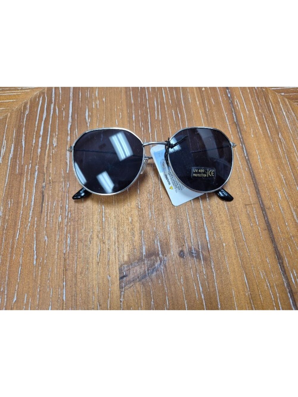 Golondrina UV400 Womens Round Sunglasses With Silver Metal Frame & Black Lenses